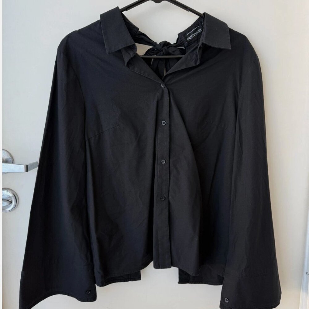 C/MEO Collective Black Bow-Tie Back Blouse with Flared Sleeves - Elegant & Chic